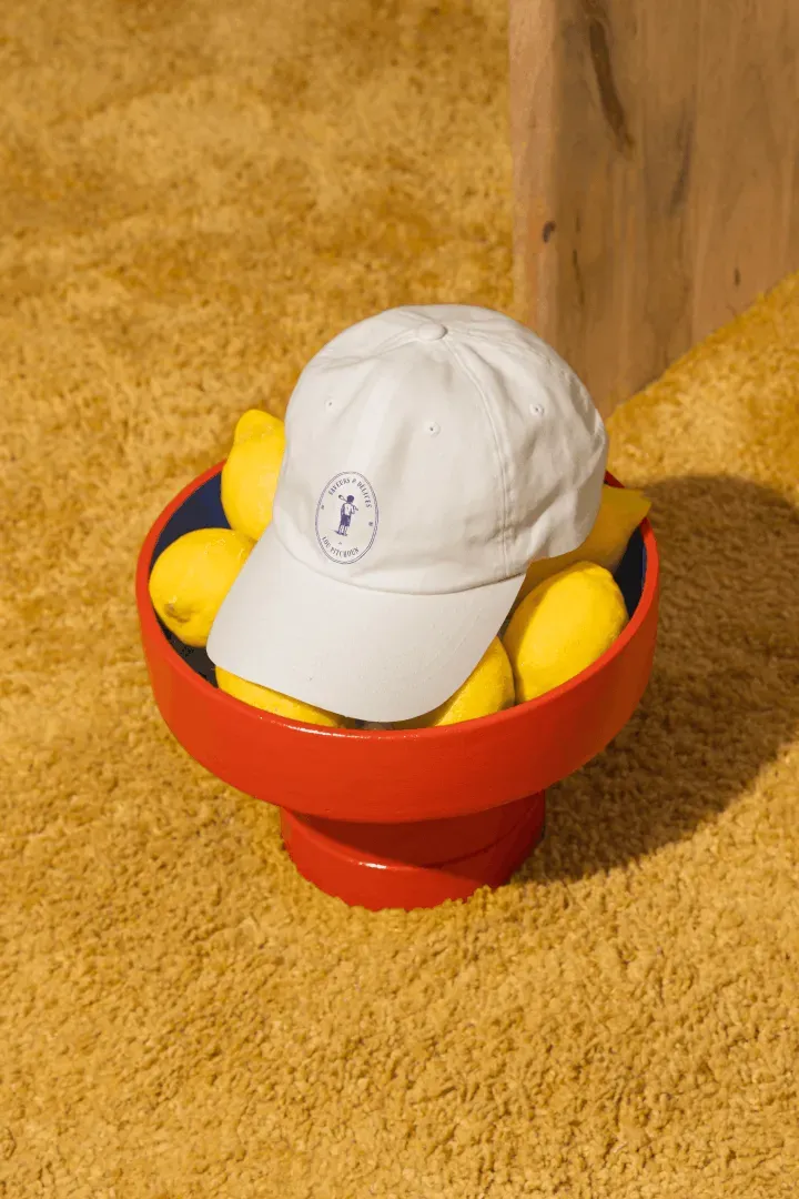 casquette et agrumes